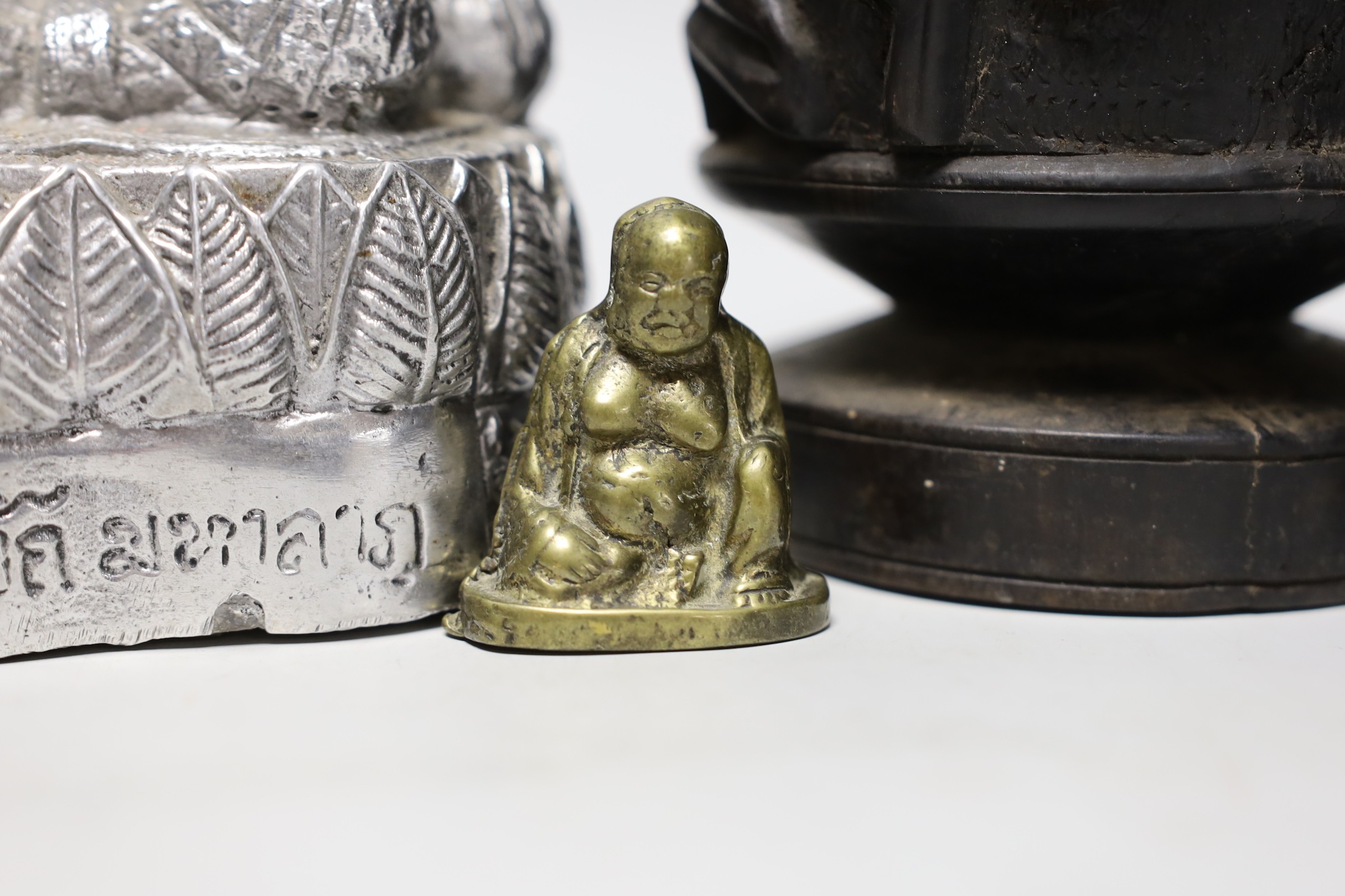 A Nepalese metal alloy figure of a Bodhisattva, 22cm and five other items